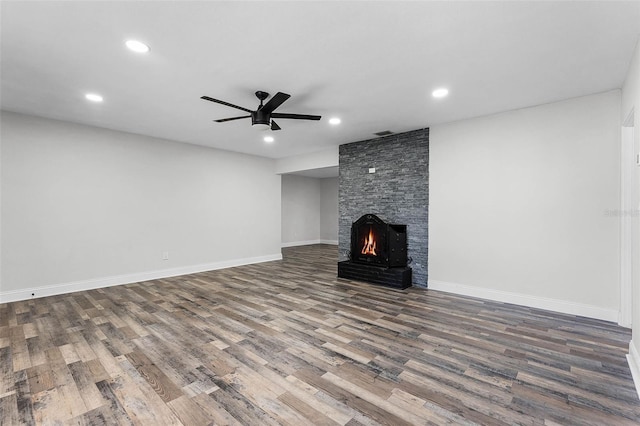 505 Lake Shore Dr, Maitland, FL 32751 - unfurnished living room with baseboards, recessed lighting, wood finished floors, ceiling fan, and a fireplace