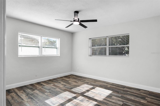 505 Lake Shore Dr, Maitland, FL 32751 - spare room featuring baseboards, a ceiling fan, and dark wood-type flooring