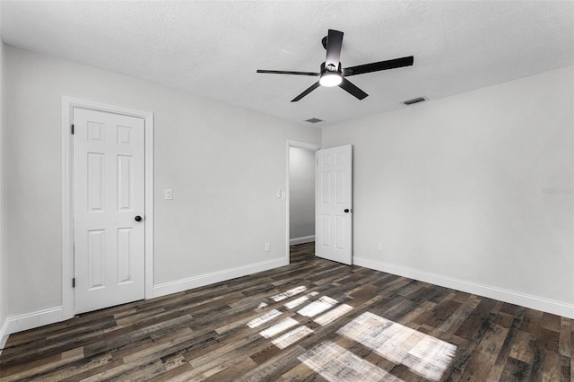 505 Lake Shore Dr, Maitland, FL 32751 - unfurnished bedroom featuring baseboards, visible vents, a ceiling fan, and dark wood-style floors