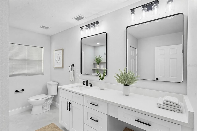505 Lake Shore Dr, Maitland, FL 32751 - bathroom with toilet, vanity, visible vents, and baseboards