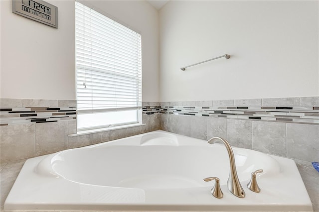 full bathroom with a bath