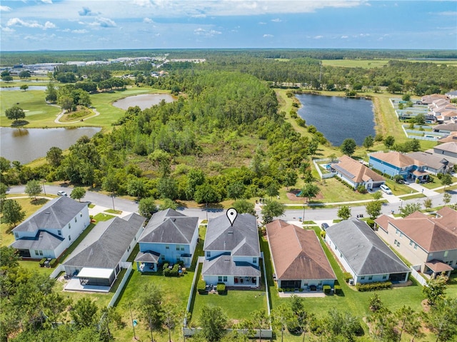 aerial view featuring a water view and a residential view