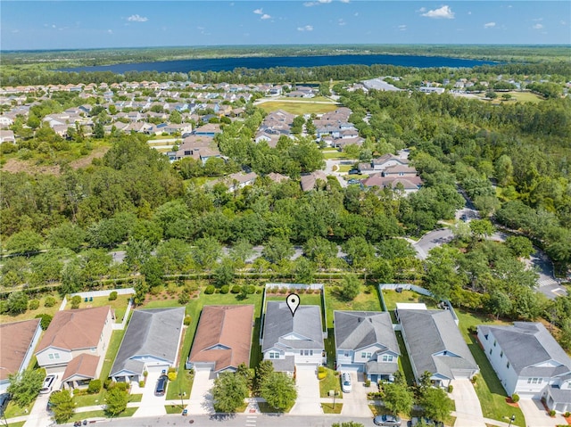 aerial view featuring a water view and a residential view