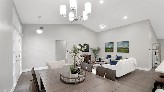 1027 Dees Dr, Oviedo, FL 32765 - dining space with wood finished floors, ceiling fan, a chandelier, lofted ceiling, and recessed lighting