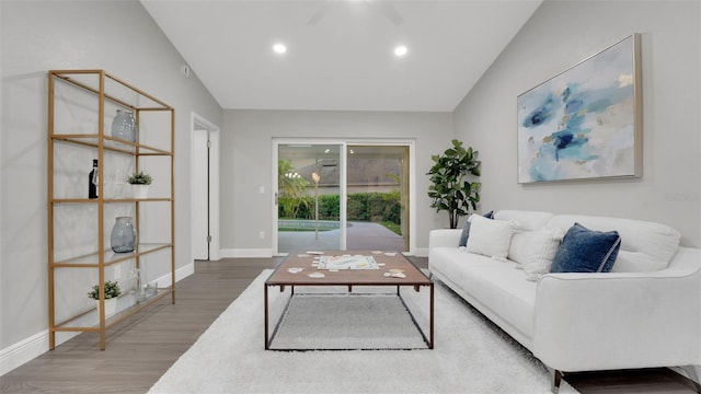 1027 Dees Dr, Oviedo, FL 32765 - living room with lofted ceiling, wood finished floors, recessed lighting, and a ceiling fan