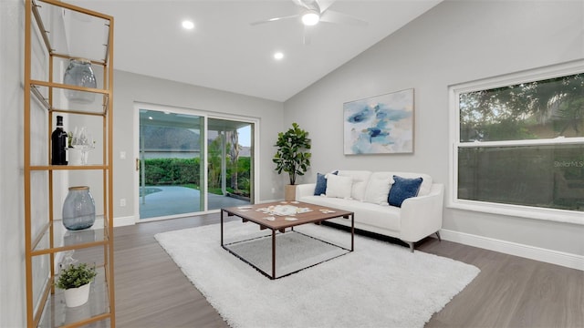 1027 Dees Dr, Oviedo, FL 32765 - living room featuring wood finished floors, a ceiling fan, recessed lighting, and high vaulted ceiling