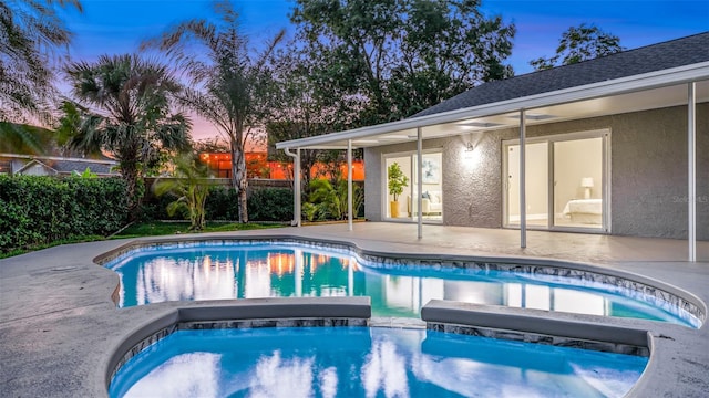 1027 Dees Dr, Oviedo, FL 32765 - view of swimming pool featuring an in-ground hot tub and a patio area