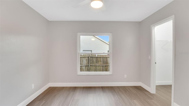 1027 Dees Dr, Oviedo, FL 32765 - spare room featuring light wood finished floors and a ceiling fan