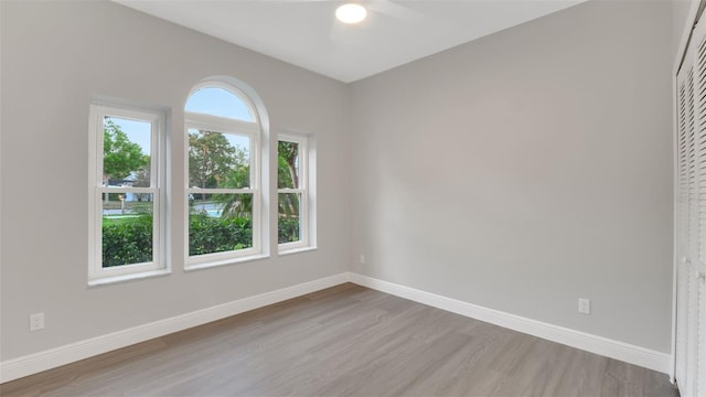 1027 Dees Dr, Oviedo, FL 32765 - unfurnished room featuring wood finished floors and a ceiling fan