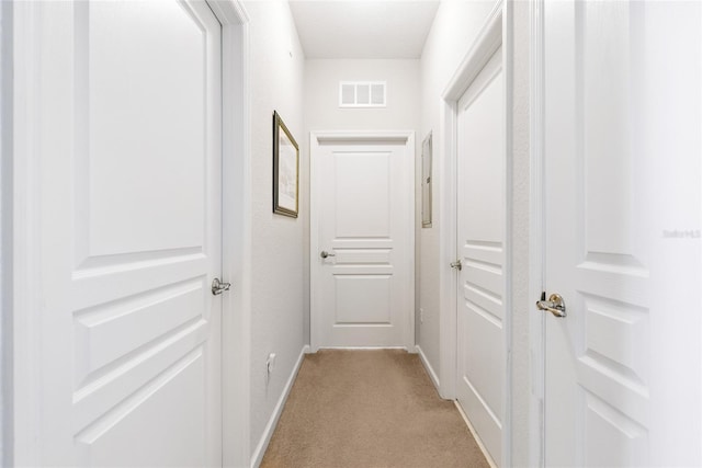 8296 Portofino Dr Unit 405, Davenport, FL 33896 - hall featuring visible vents, baseboards, and light carpet