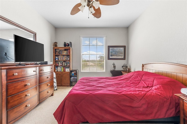 8296 Portofino Dr Unit 405, Davenport, FL 33896 - bedroom with light colored carpet and ceiling fan