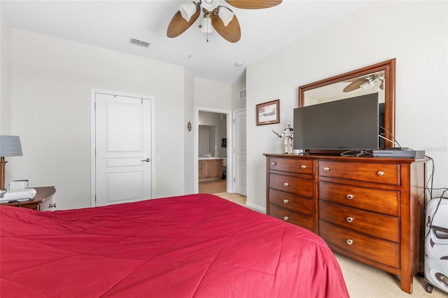 8296 Portofino Dr Unit 405, Davenport, FL 33896 - bedroom with visible vents, ceiling fan, and connected bathroom