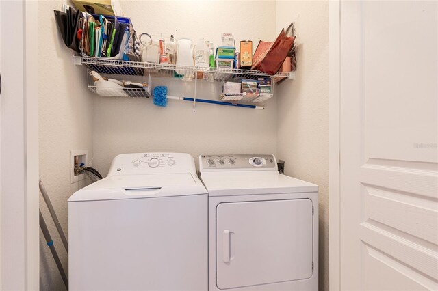 8296 Portofino Dr Unit 405, Davenport, FL 33896 - washroom featuring laundry area and washing machine and clothes dryer