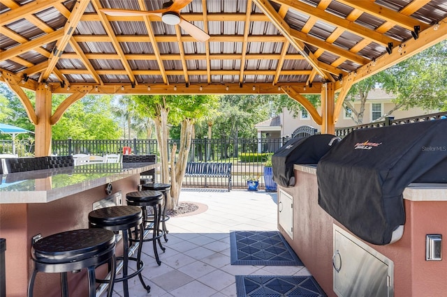8296 Portofino Dr Unit 405, Davenport, FL 33896 - view of patio / terrace with a gazebo, fence, and ceiling fan