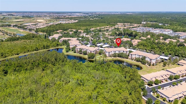 8296 Portofino Dr Unit 405, Davenport, FL 33896 - birds eye view of property featuring a water view and a view of trees