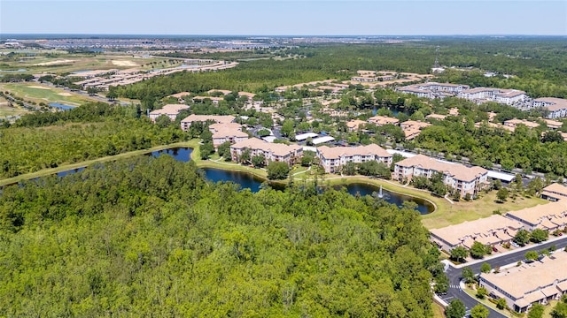 8296 Portofino Dr Unit 405, Davenport, FL 33896 - aerial view with a water view and a wooded view