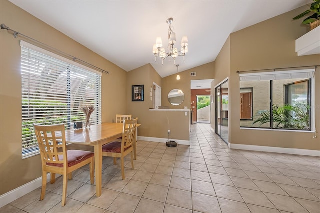 dining room featuring light tile patterned floors, baseboards, an inviting chandelier, and lofted ceiling