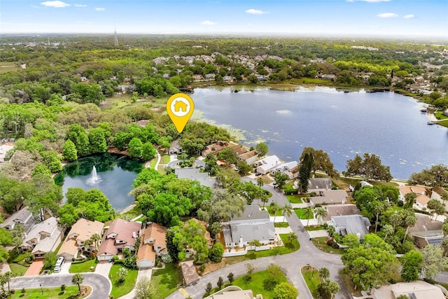 aerial view with a residential view and a water view
