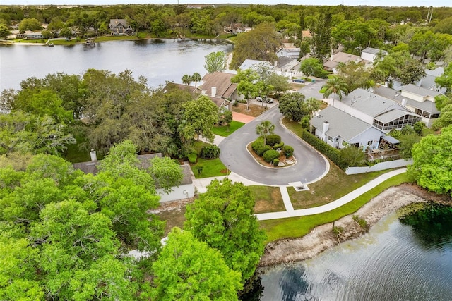birds eye view of property featuring a residential view and a water view