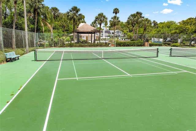 view of sport court featuring community basketball court and fence