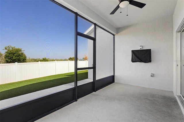 unfurnished sunroom featuring a healthy amount of sunlight