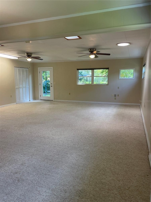 275 Virginia Dr, Winter Garden, FL 34787 - carpeted spare room featuring ceiling fan, baseboards, and ornamental molding