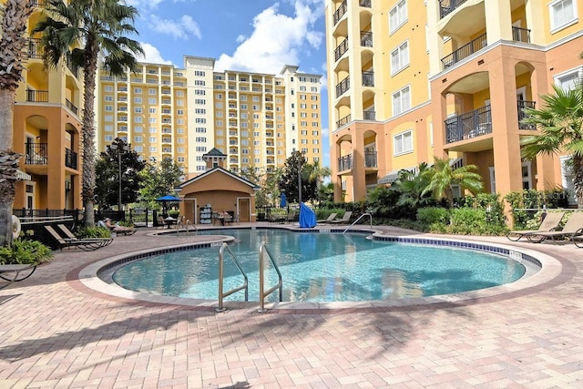 8112 Poinciana Blvd Unit 1809, Orlando, FL 32821 - community pool with a patio