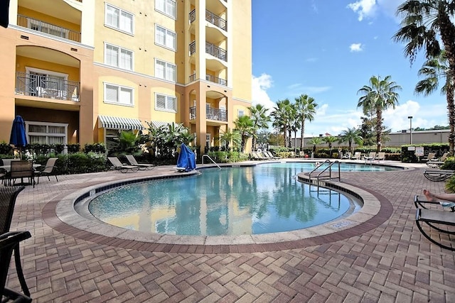8112 Poinciana Blvd Unit 1809, Orlando, FL 32821 - pool with a patio