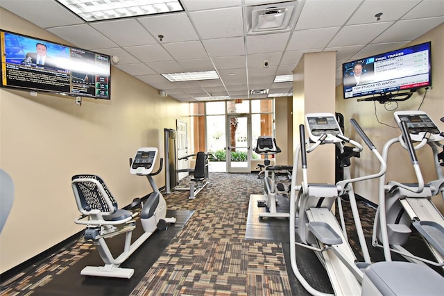 8112 Poinciana Blvd Unit 1809, Orlando, FL 32821 - gym featuring expansive windows, carpet flooring, a drop ceiling, and french doors