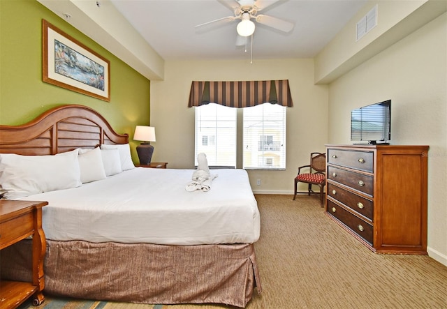 8112 Poinciana Blvd Unit 1809, Orlando, FL 32821 - bedroom featuring a ceiling fan, visible vents, light colored carpet, and baseboards
