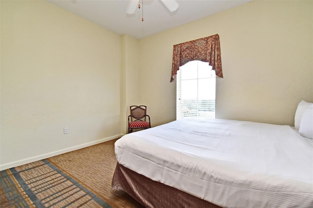 8112 Poinciana Blvd Unit 1809, Orlando, FL 32821 - carpeted bedroom featuring a ceiling fan and baseboards