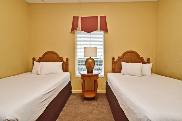 8112 Poinciana Blvd Unit 1809, Orlando, FL 32821 - carpeted bedroom featuring baseboards