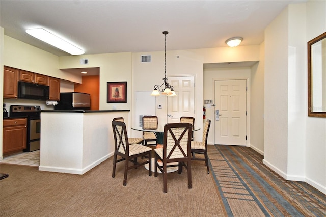 8112 Poinciana Blvd Unit 1809, Orlando, FL 32821 - dining space with baseboards, visible vents, and carpet