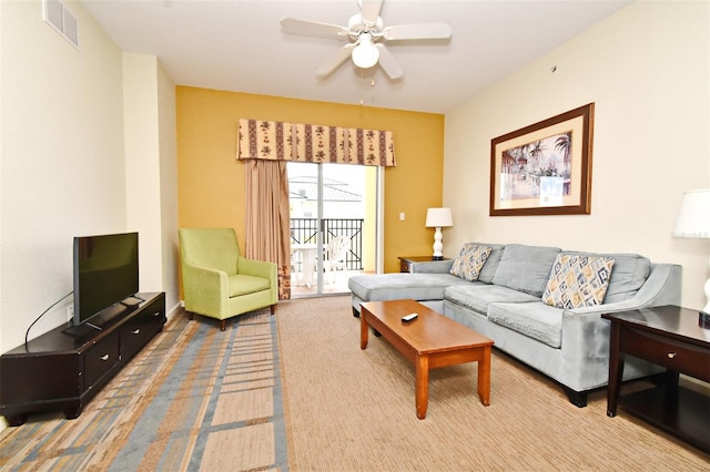 8112 Poinciana Blvd Unit 1809, Orlando, FL 32821 - living room featuring visible vents, ceiling fan, and carpet flooring