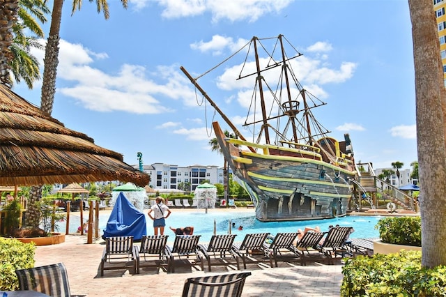 8112 Poinciana Blvd Unit 1809, Orlando, FL 32821 - community pool with a water slide