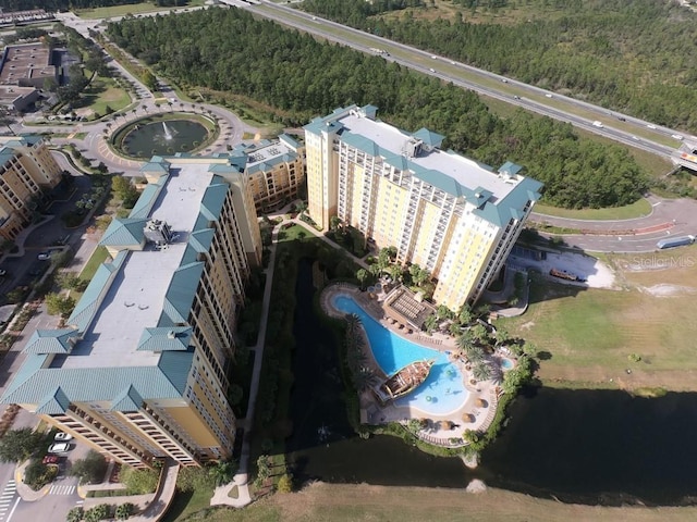 8112 Poinciana Blvd Unit 1809, Orlando, FL 32821 - birds eye view of property with a water view and a forest view