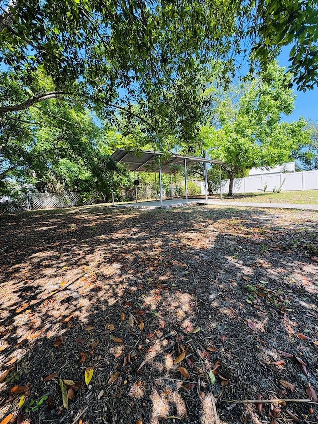 view of yard featuring fence