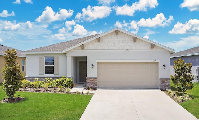 ranch-style house featuring a front yard, stone siding, stucco siding, concrete driveway, and an attached garage