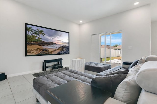 tiled cinema featuring baseboards and recessed lighting