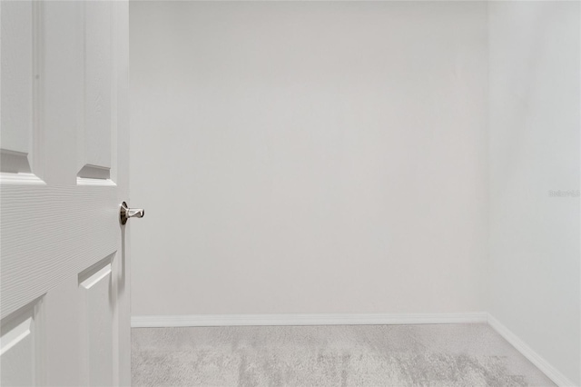 interior space featuring baseboards