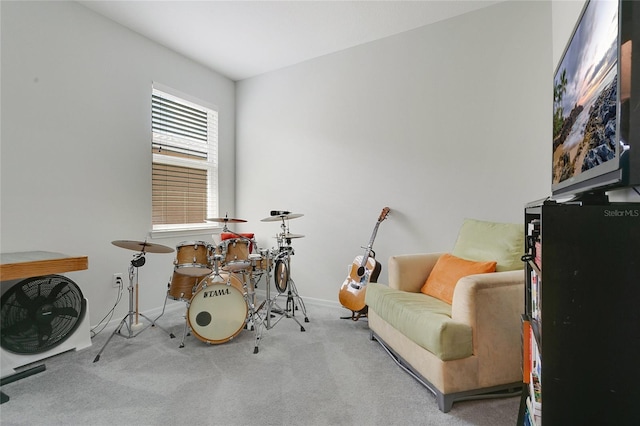 game room with carpet floors and baseboards