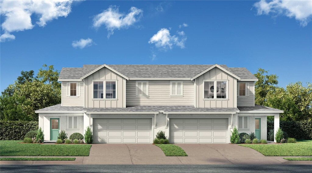 view of front of house featuring board and batten siding, a shingled roof, concrete driveway, and a garage
