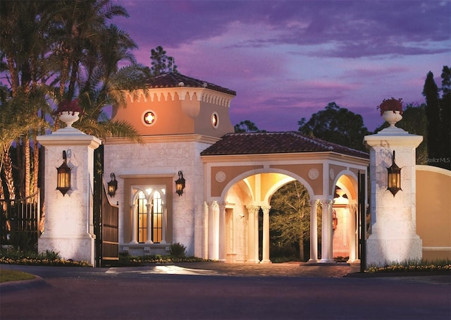 10160 Autumn Mist Ln Unit 601, Golden Oak, FL 32836 - mediterranean / spanish home featuring driveway