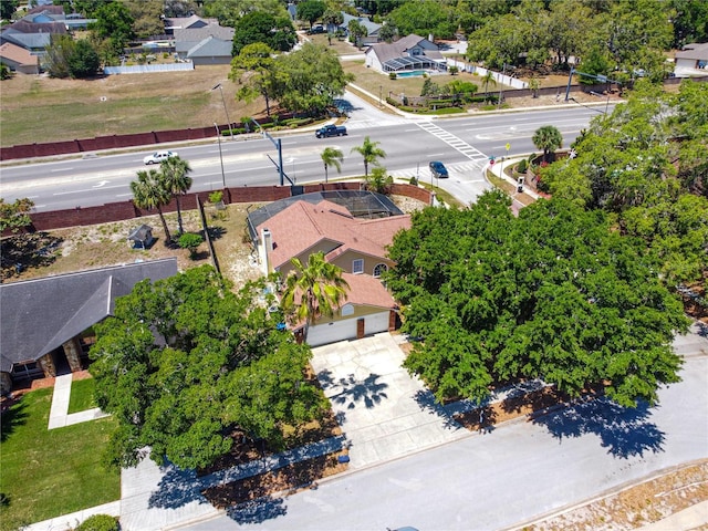 birds eye view of property with a residential view