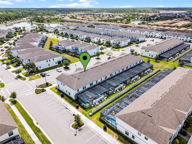2432 Tangier Dr, Kissimmee, FL 34747 - drone / aerial view featuring a water view and a residential view