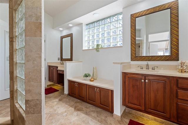 7264 Hawksnest Blvd, Orlando, FL 32835 - bathroom with two vanities and walk in shower
