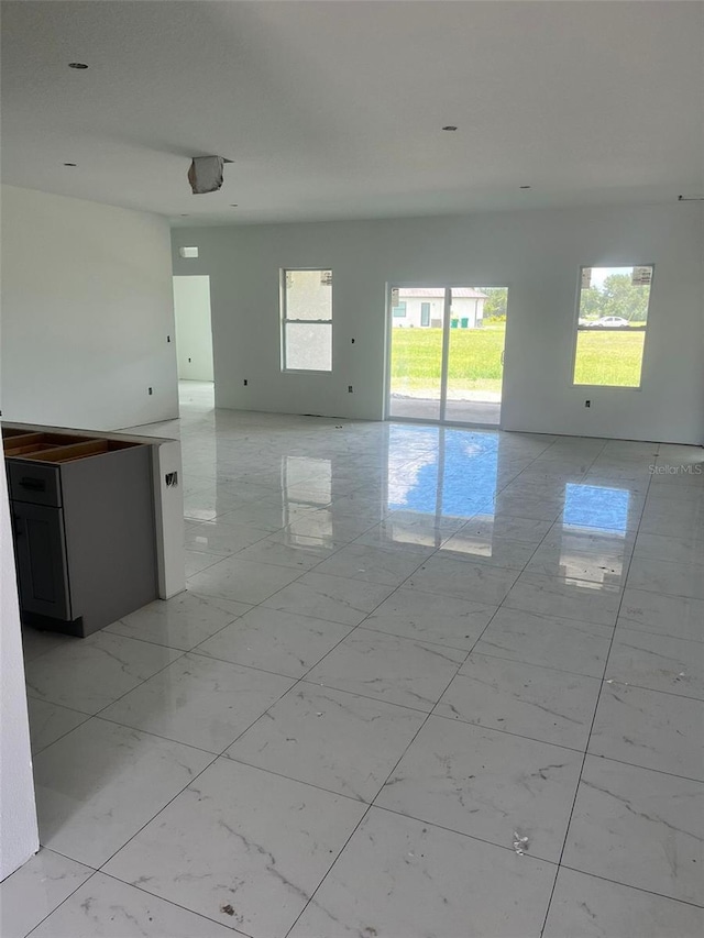 24462 Cabana Rd, Punta Gorda, FL 33955 - empty room featuring light marble finish floors