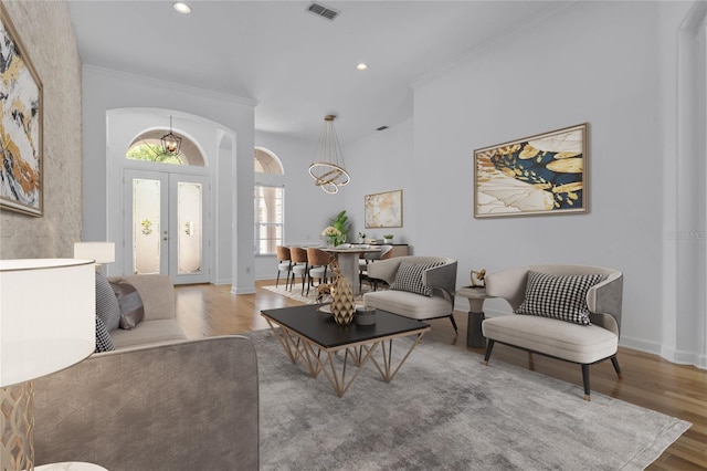 1803 Glenbay Ct, Windermere, FL 34786 - living room with crown molding, french doors, recessed lighting, wood finished floors, and visible vents