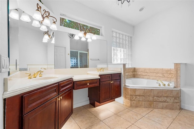 1803 Glenbay Ct, Windermere, FL 34786 - bathroom featuring a garden tub, a shower stall, two vanities, a sink, and tile patterned floors