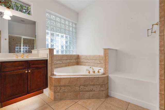 1803 Glenbay Ct, Windermere, FL 34786 - full bathroom with vanity, tile patterned flooring, a stall shower, and a bath
